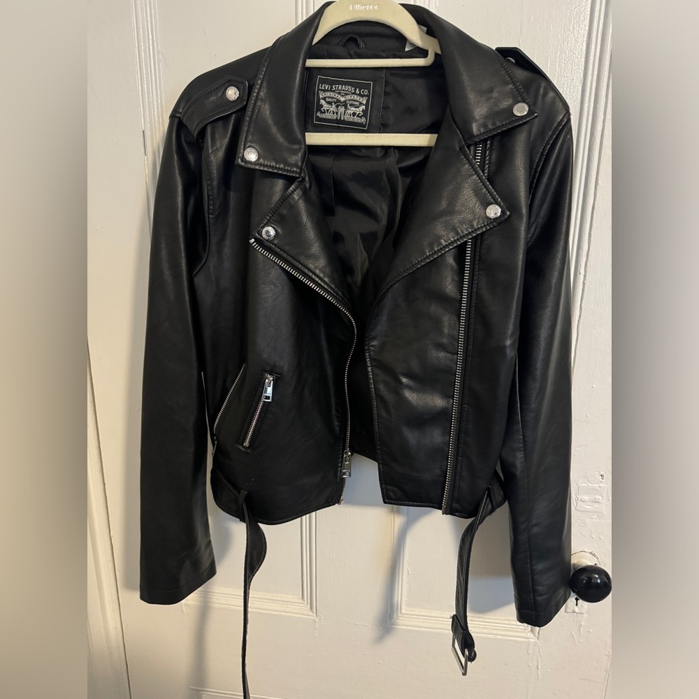 women Levi black faux leather jacket with belt zipper and zipper on sleeves